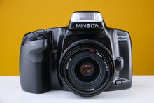 Load image into Gallery viewer, Minolta Dynax 300SI 35mm SLR Film Camera Kit with 28mm f2.8 and 70-210 f4 Lens
