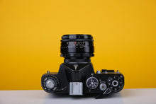 Load image into Gallery viewer, Zenit EM Grey Leather 35mm Film Camera with Helion 44M-4 Lens 58mm f/2
