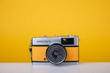 Load image into Gallery viewer, Olympus Trip 35 Vintage Film Camera with Zuiko 40mm f2.8 Lens With New Yellow Leather Skin
