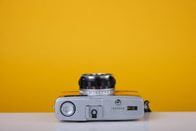 Load image into Gallery viewer, Olympus Trip 35 Vintage Film Camera with Zuiko 40mm f2.8 Lens With New Yellow Leather Skin
