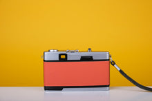 Load image into Gallery viewer, Olympus Trip 35 Vintage 35mm Film Camera with Zuiko 40mm f2.8 Lens and New Orange Leather Skin

