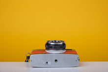 Load image into Gallery viewer, Olympus Trip 35 Vintage 35mm Film Camera with Zuiko 40mm f2.8 Lens and New Orange Leather Skin
