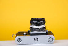 Load image into Gallery viewer, Nikon F 35mm SLR Film Camera with 50mm f2 Lens
