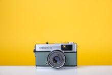 Load image into Gallery viewer, Olympus Trip 35 Vintage 35mm Film Camera with Zuiko 40mm f2.8 Lens and New Grey Leather Skin
