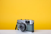 Load image into Gallery viewer, Olympus Trip 35 Vintage 35mm Film Camera with Zuiko 40mm f2.8 Lens and New Grey Leather Skin
