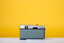 Load image into Gallery viewer, Olympus Trip 35 Vintage 35mm Film Camera with Zuiko 40mm f2.8 Lens and New Grey Leather Skin

