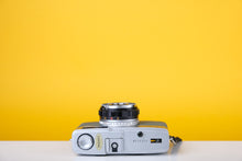 Load image into Gallery viewer, Olympus Trip 35 Vintage 35mm Film Camera with Zuiko 40mm f2.8 Lens and New Grey Leather Skin
