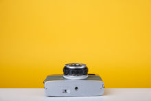 Load image into Gallery viewer, Olympus Trip 35 Vintage 35mm Film Camera with Zuiko 40mm f2.8 Lens and New Grey Leather Skin
