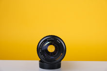 Load image into Gallery viewer, Bell &amp; Howell 80-205mm f4.5 Macro Lens For Olympus

