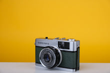 Load image into Gallery viewer, Olympus Trip 35 Vintage Film Camera With Dark Green Leather Skin
