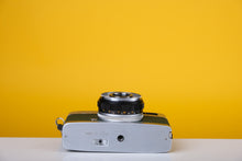 Load image into Gallery viewer, Olympus Trip 35 Vintage Film Camera With Dark Green Leather Skin
