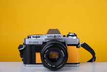 Load image into Gallery viewer, Minolta X-300 Silver 35mm SLR Film Camera with 50mm f1.7 Lens
