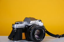 Load image into Gallery viewer, Minolta X-300 Silver 35mm SLR Film Camera with 50mm f1.7 Lens
