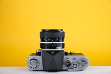 Load image into Gallery viewer, Nikon F 35mm SLR Film Camera With Nikkor 28mm f3.5 Lens
