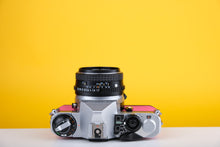 Load image into Gallery viewer, Pentax ME Super 35mm SLR Film Camera with SMC Pentax-M 50mm f1.7 Lens Pink
