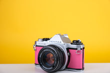 Load image into Gallery viewer, Pentax ME Super 35mm SLR Film Camera with SMC Pentax-M 50mm f1.7 Lens Pink
