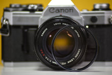Load image into Gallery viewer, Canon AE-1 Vintage 35mm SLR Film Camera With 50mm F1.4 Prime Lens
