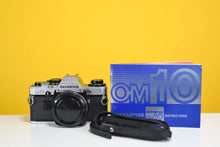 Load image into Gallery viewer, Olympus Om10 Slr Vintage 35mm Film Camera with Zuiko 50mm f1.8 Prime Lens, Lens Filter, Strap and Olympus Manual Adapter
