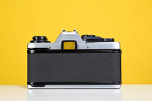 Load image into Gallery viewer, Olympus Om10 Slr Vintage 35mm Film Camera with Zuiko 50mm f1.8 Prime Lens, Lens Filter, Strap and Olympus Manual Adapter
