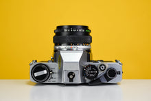 Load image into Gallery viewer, Olympus Om10 Slr Vintage 35mm Film Camera with Zuiko 50mm f1.8 Prime Lens, Lens Filter, Strap and Olympus Manual Adapter
