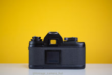 Load image into Gallery viewer, Nikon EM 35mm Film Camera with Nikon 50mm f/1.8 Lens
