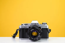 Load image into Gallery viewer, Minolta X-300 Vintage 35mm Film Camera with Minolta MD 50mm f/1.7 Prime Lens
