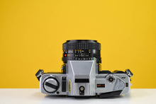 Load image into Gallery viewer, Minolta X-300 Vintage 35mm Film Camera with Minolta MD 50mm f/1.7 Prime Lens
