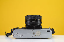 Load image into Gallery viewer, Minolta X-300 Vintage 35mm Film Camera with Minolta MD 50mm f/1.7 Prime Lens

