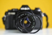 Load image into Gallery viewer, Minolta X-700 Vintage 35mm Film Camera with Minolta MD Zoom 35-105mm Lens and Strap
