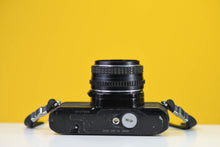 Load image into Gallery viewer, Pentax MV 35mm SLR Film Camera with Pentax-M 50mm f/2 Lens
