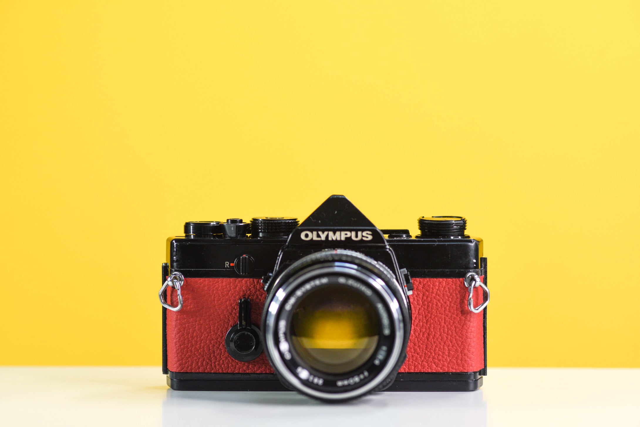Olympus OM-1 Black Vintage 35mm Film Camera with Zuiko 50mm f/1.4 Lens New Orange Leather Skin