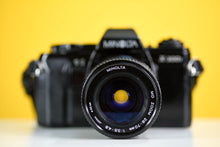 Load image into Gallery viewer, Minolta X-300s Vintage 35mm Film Camera with MInolta MD Zoom 28-70mm f/3.5 Lens
