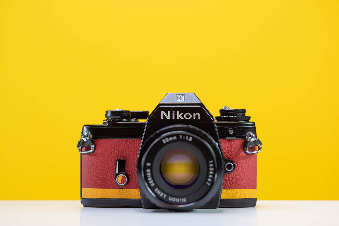 nikon em