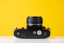 Load image into Gallery viewer, Nikon EM 35mm Film Camera with Nikon 50mm f/1.8 Lens
