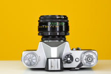 Load image into Gallery viewer, Zenit-B 35mm Film Camera with Helios 44-2 58mm f2 Lens
