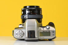 Load image into Gallery viewer, Minolta Dynax 4 35mm Film Camera with 35-70mm f4 Lens
