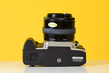 Load image into Gallery viewer, Minolta Dynax 4 35mm Film Camera with 35-70mm f4 Lens
