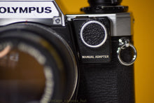 Load image into Gallery viewer, Olympus OM10 SLR Vintage 35mm Film Camera with Zuiko Auto-T 135mm f3.5 Prime Lens with Manual Adapter And Olympus Flash
