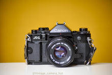 Load image into Gallery viewer, Canon A-1 Vintage 35mm Film Camera with Canon FD 50mm f/1.8 lens
