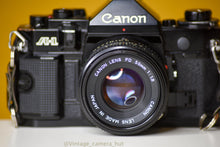 Load image into Gallery viewer, Canon A-1 Vintage 35mm Film Camera with Canon FD 50mm f/1.8 lens
