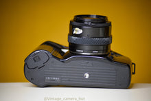 Load image into Gallery viewer, Minolta Dynax 7xi 35mm Film Camera with Minolta AF Zoom 35-70mm f/4 Lens
