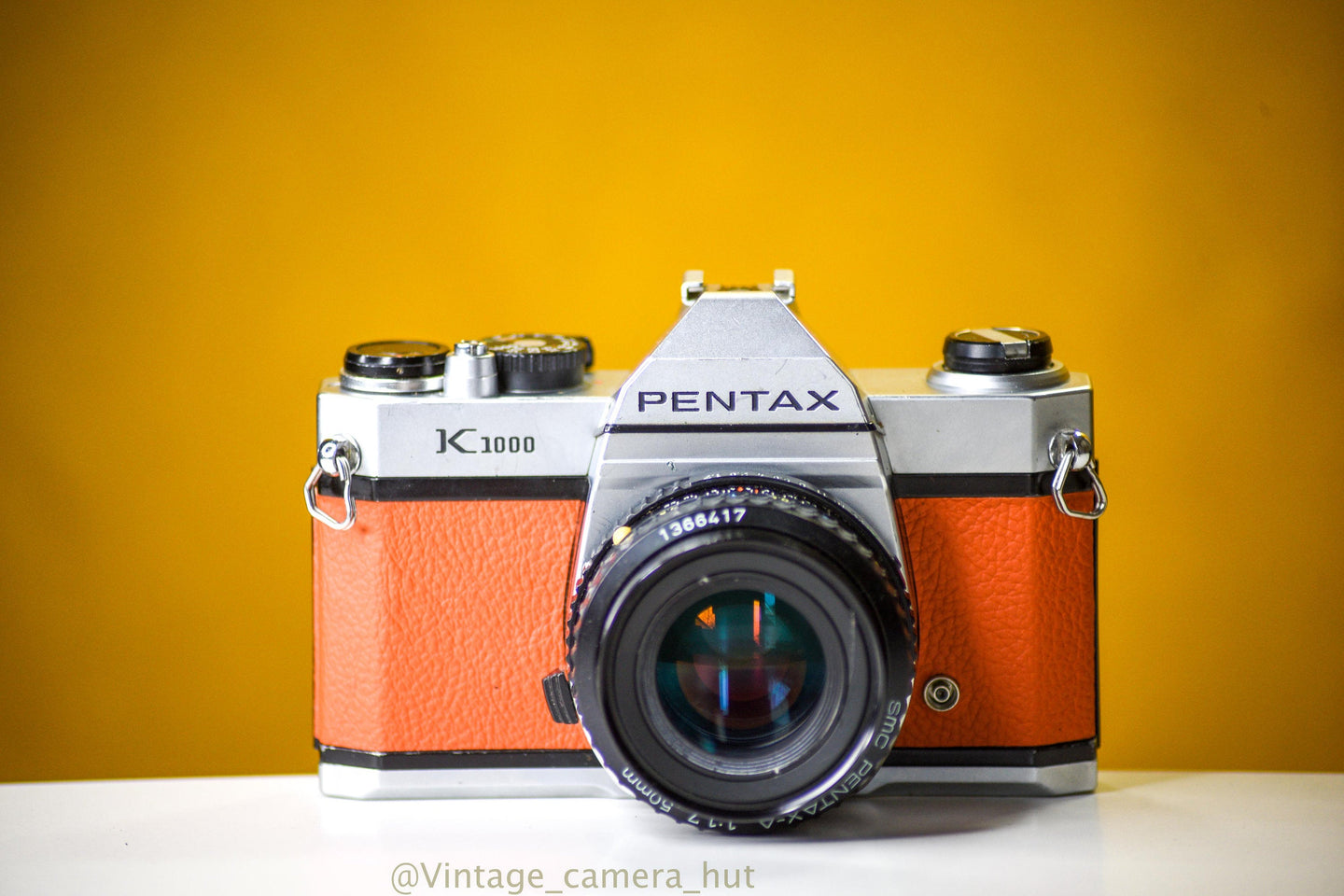 Pentax K1000 35mm Film Camera with SMC-M 50mm f/1.7 Prime Lens in Orange